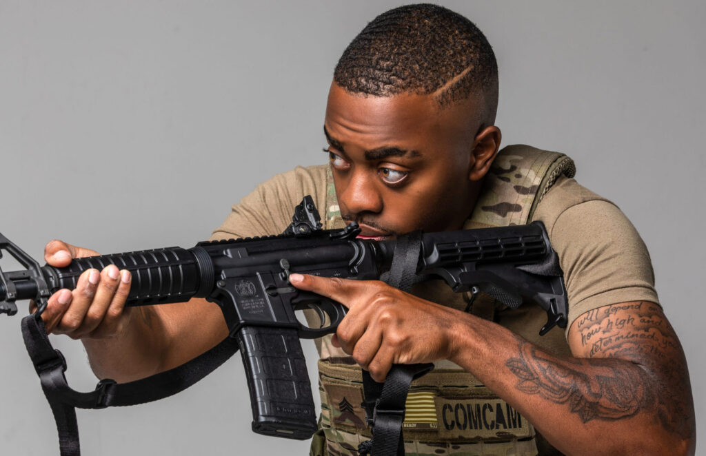 Atlanta photographer and videographer capturing soldier holding a gun